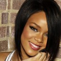 Rihanna topless su Facebook e avances a Kutcher, Foto